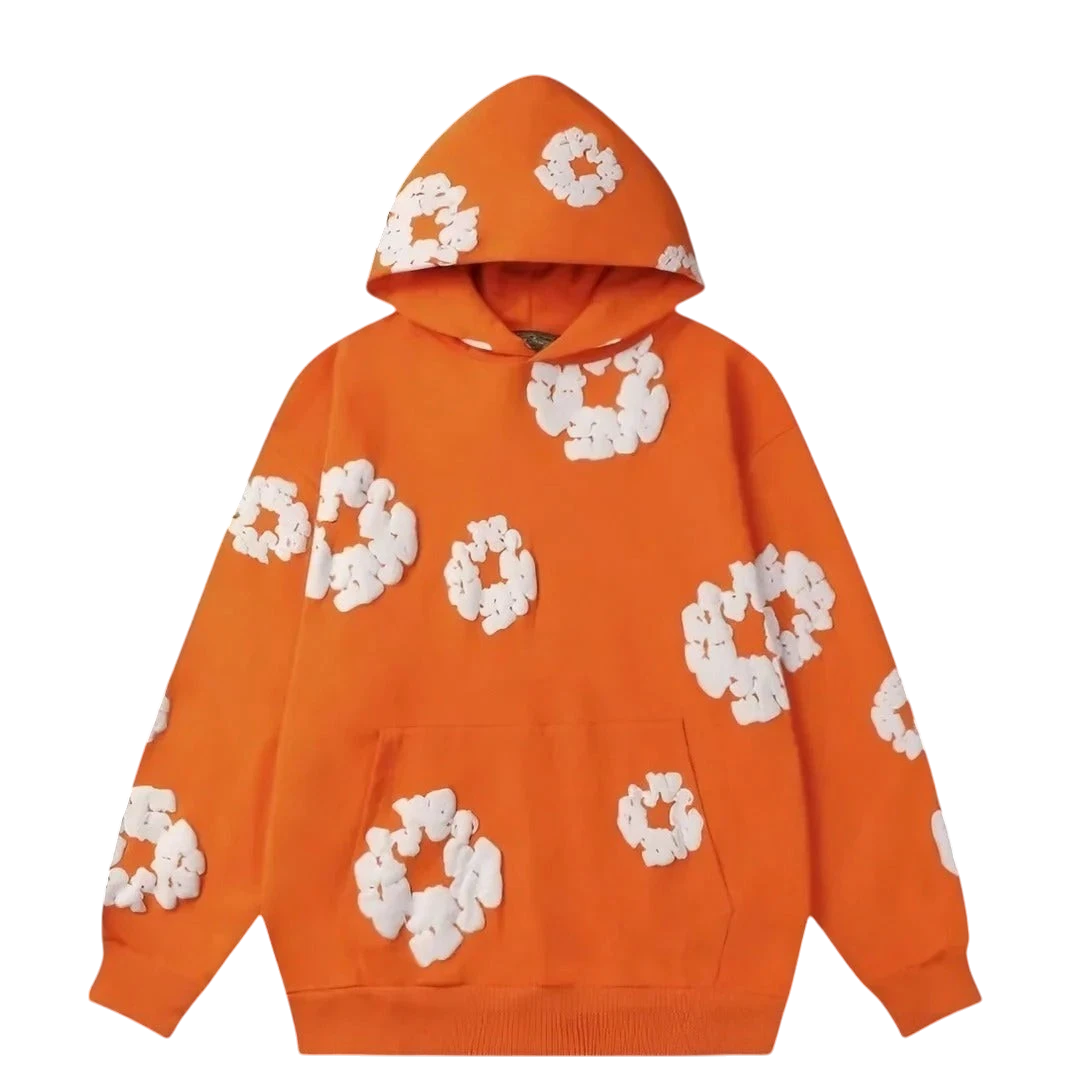 NOVAIRE bright orange hoodie featuring a white 3D floral applique pattern and a front kangaroo pocket.